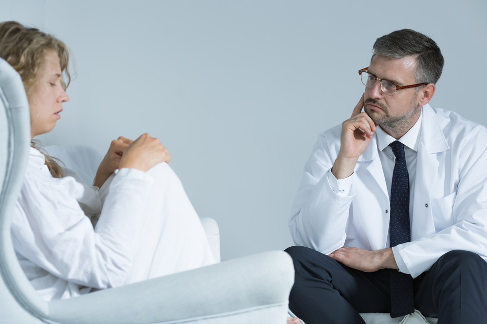 Doctor diagnosing bipolar disorder syndrome
