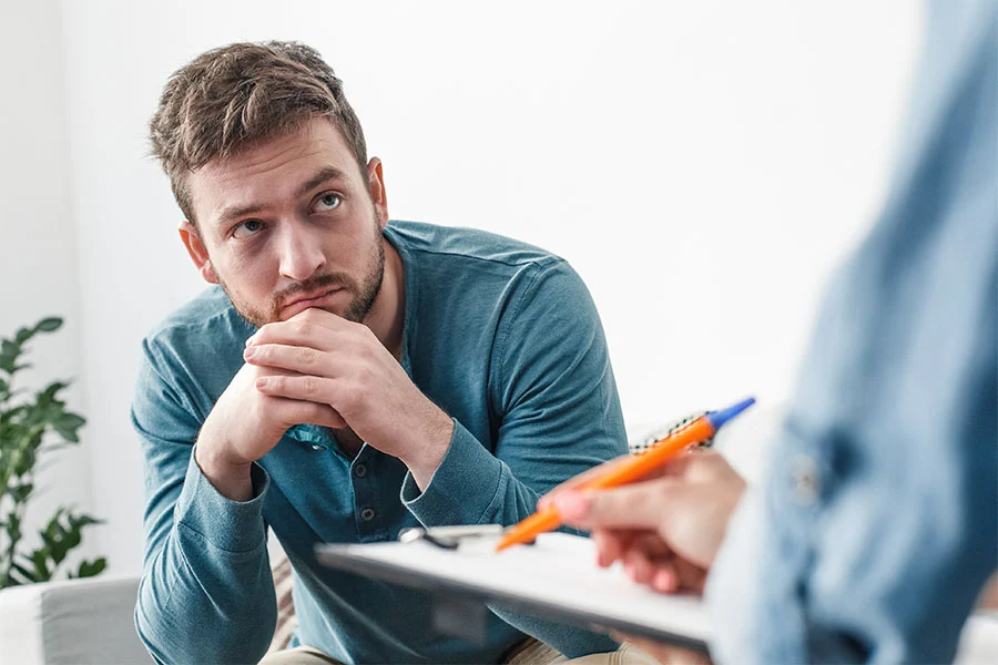 Young adult man understanding the cycle of addiction as part of addiction education.