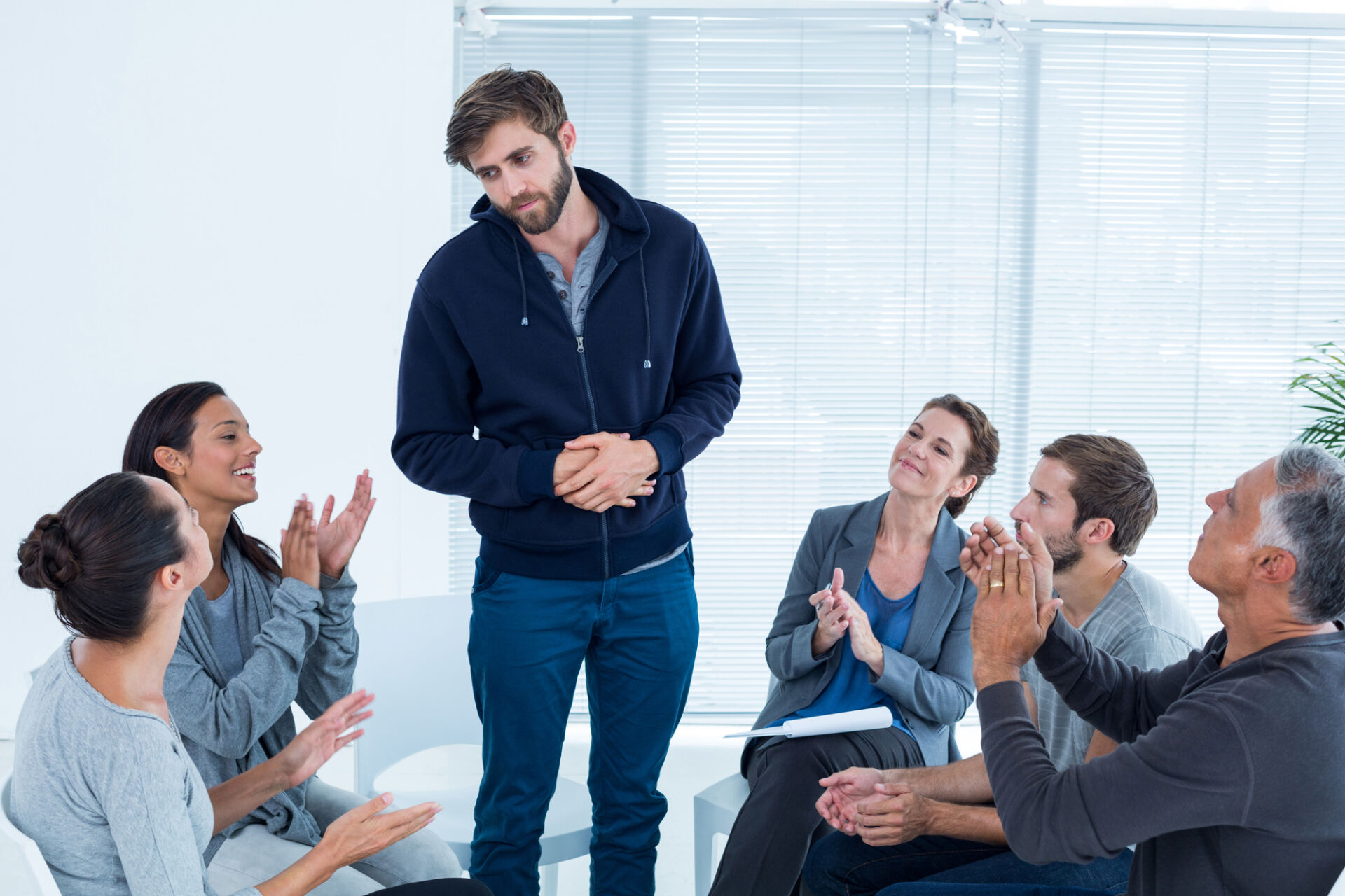 An image representing a doctor and patient discussing how to evaluate a partial hospitalization program as the best option